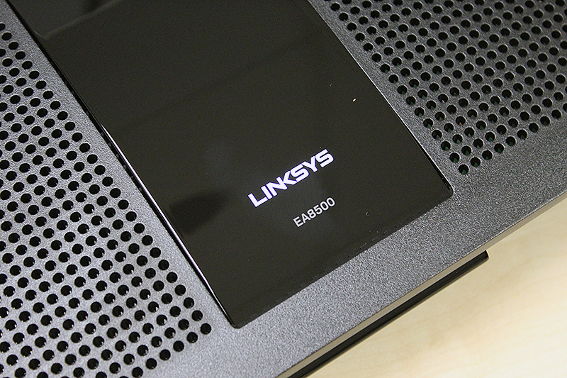 Unlike the older E8350 router, the Linksys logo on the EA8500 router actually lights up.